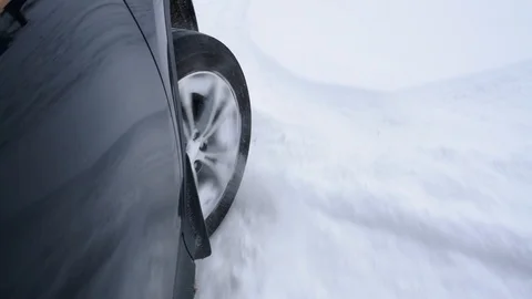 Wheel of a car drifting in the snow Video stock 120699338