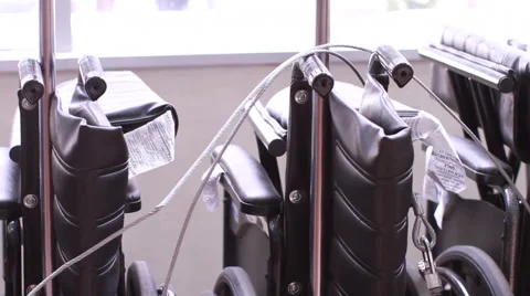 Wheel Chairs Lined Up (Tracking Shot) Stock Footage 47114917