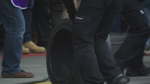 Wheel change in Pit Stop at Car Racing - Auto Race - Slow Motion - Racing Track Stock Footage 146187713