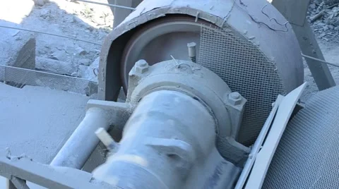Wheel of conveyer on deposit basalt Stock Footage 53573348