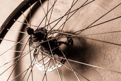Wheel  on the gray wall background Foto stock