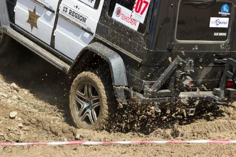 Wheel of a jeep in the mud Stock Photos