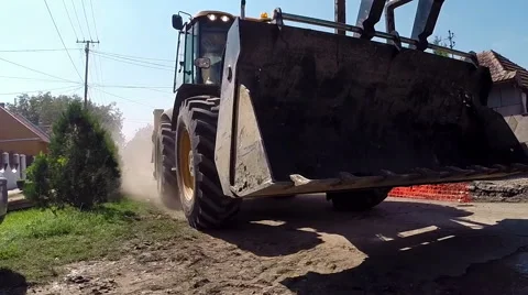 Wheel Loader Bulldozer in Dangerous Action Stock Footage 65904685