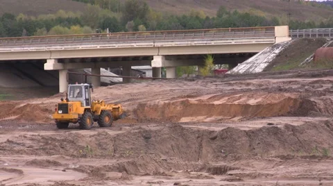 The wheel loader digs the earth . Timelapse Video stock 49408004