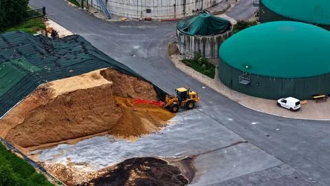 Wheel Loader Handling Silage at a Modern Biogas Plant Stock Photos