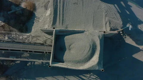 Wheel loader load stone in crusher, works on production of building materials Stock Footage 165872190