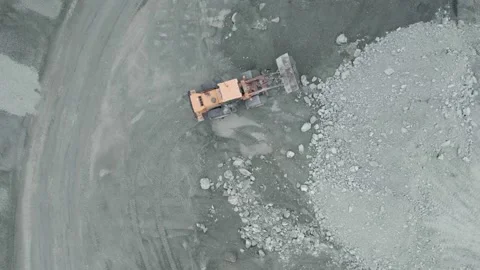 A wheel loader moves the aggregate in an opencast mine. Stock Footage 154632647