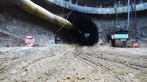 Wheel Loader Operation Carrying Excavated Soil in Tunnel Construction Stock Footage 333409071