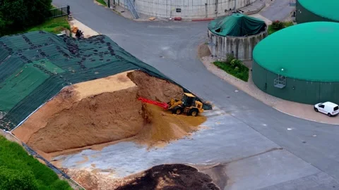 Wheel Loader Removing Silage at a Modern Biogas Plant Stock Footage 340138279