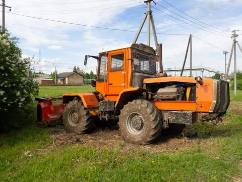 Wheel loader. Yellow front loader. Front-end loader of the tractor. Heavy Equ Stock Photos