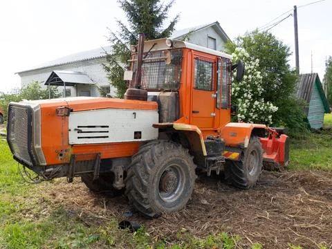 Wheel loader. Yellow front loader. Front-end loader of the tractor. Heavy Equ Stock Photos