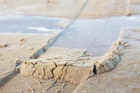 Wheel marks on sand. Stock Photos