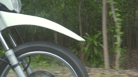 Wheel motorcycle riding on on road while moto travel. Biker man driving on Stock Footage 111959366