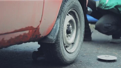 Wheel mounting on an old car Stock Footage 73802749