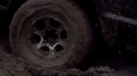 Wheel in the Mud HD Video stock 33999906