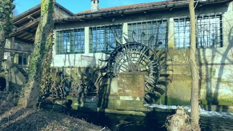 Wheel of an old working mill Stock Footage 263556383