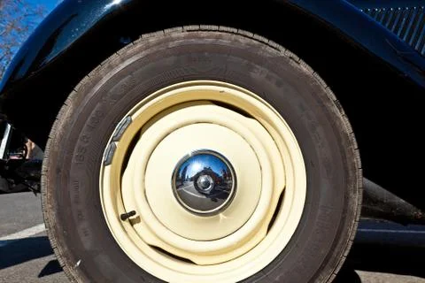 Wheel of an oldtimer car Stock Photos