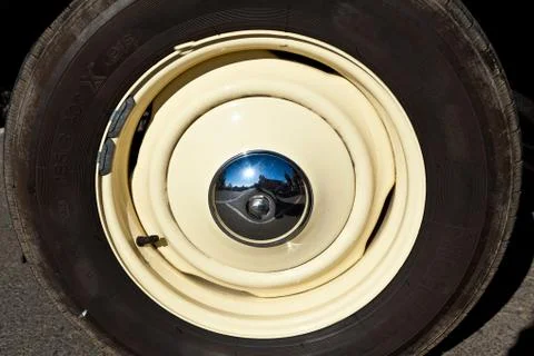 Wheel of an oldtimer car Stock Photos