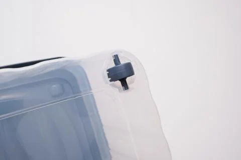 A wheel of a plastic container for the storage of all accessories against white Stock Photos