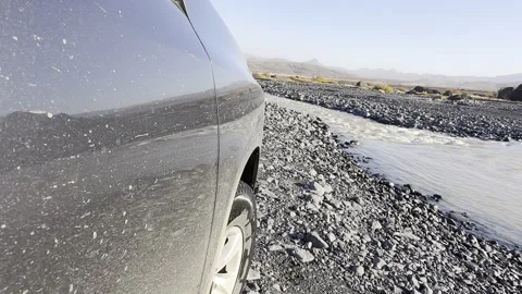 Wheel POV Driving Toward River Crossing in Iceland Highlands Stock Footage 334258104