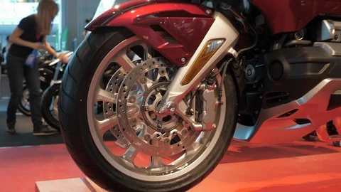 The wheel of the red bike Stock Footage 106685364