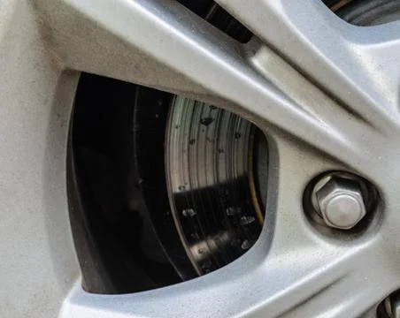 Wheel rim section and nut Stock Photos