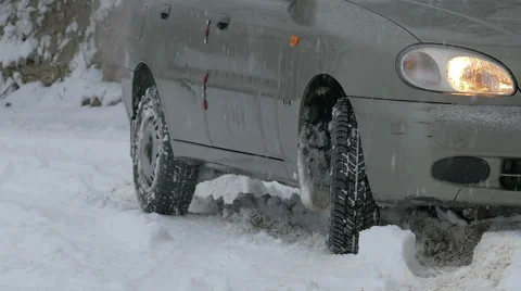 Wheel slip on snow Stock Footage 58800912
