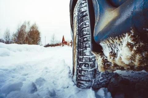 Wheel in the snow Stock Photos
