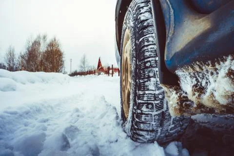 Wheel in the snow Stock Photos