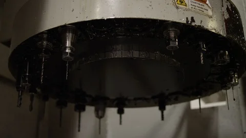 Wheel of tools for creating molds in a mold machine in a manufacturing plant Stock Footage 129987649