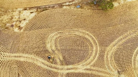 Wheel tracks and patterns in a harvested field Stock Footage 327945885