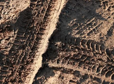 Wheel tracks in mud Stock Photos