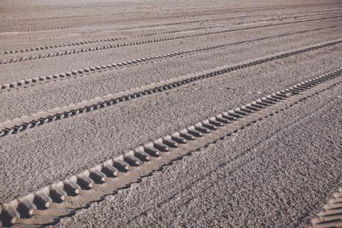 Wheel tracks in the sand Stock Photos