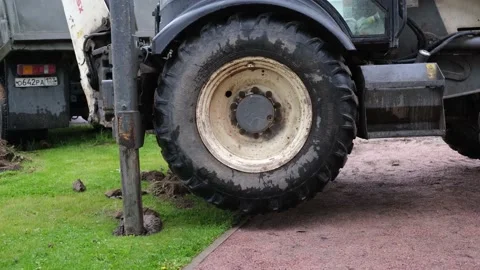 The wheel of tractor is rotating. Video stock 132648097