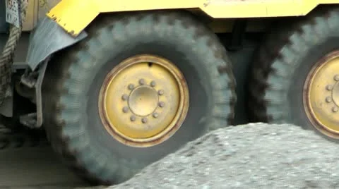 The wheel tractor in work, cleans and levels a ground and the earth Stock-Footage 10709642