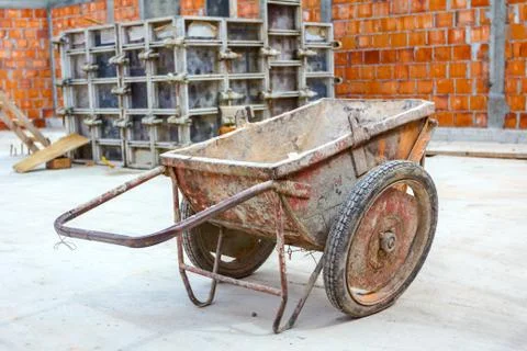 Wheelbarrow at building site Stock Photos