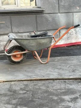 Wheelbarrow at Construction Site Stock Photos