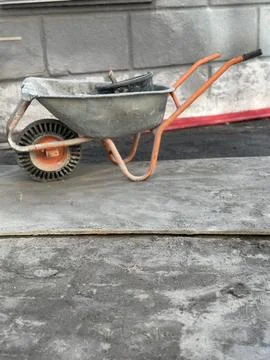 Wheelbarrow at Construction Site Stock Photos