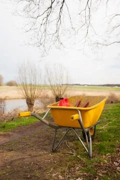 Wheelbarrow in the forest Stock Photos