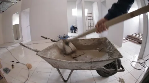 Wheelbarrow full of cement Stock Footage 47574863