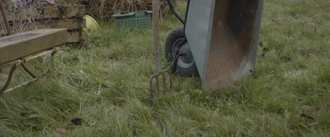 Wheelbarrow in garden Stock Footage 127418774