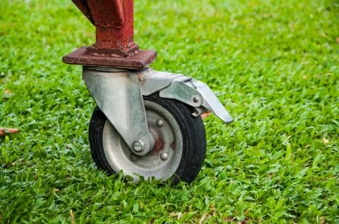 Wheelbarrow in the garden Stock Photos