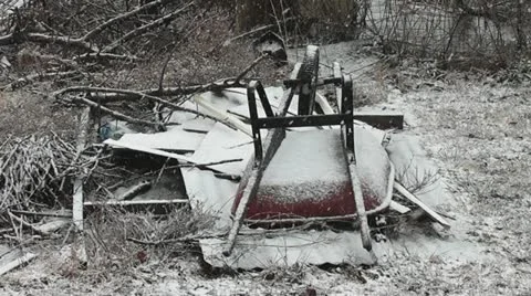 Wheelbarrow in snowstorm Stock Footage 21241933