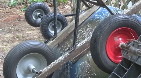 Wheelbarrow Wheel Turning 2 Stockbeeldmateriaal 38461773