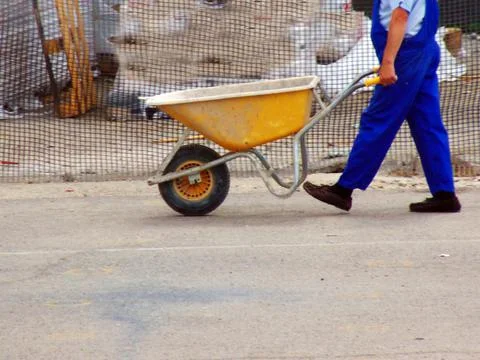 A wheelbarrow worker - construction Fotos de archivo