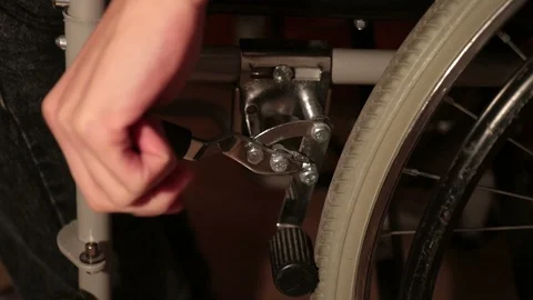 Wheelchair brake Stock Footage 99964527