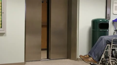 Wheelchair Entering Elevator Stock Footage 12313965