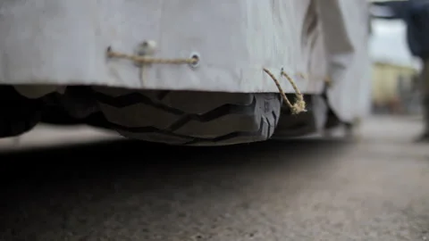 Wheeled cargo being lowered onto platform Stock Footage 310748978