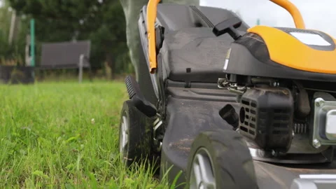 Wheeled lawn mower captured in close detail. Stock Footage 316800161
