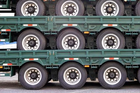 Wheeled platform trailers for trucks for transporting bulky cargo. Copy space Stock Photos